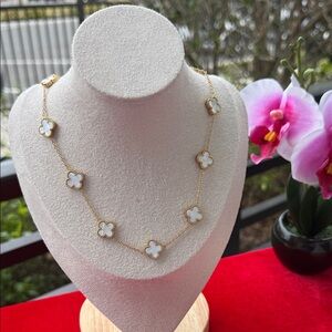 Elegant Gold and White Clover Necklace